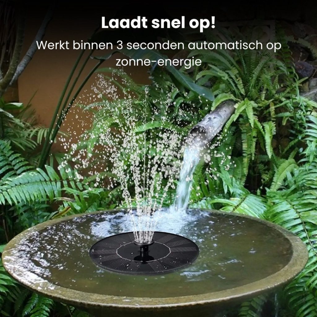 Een fontein op zonne-energie sproeit in een vogelbadje tussen de planten. "Laadt snel op!".